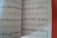 All-in-one Blues Guitar Solos (mit CD) Gitarrenbuch